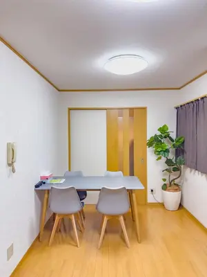 a conference room with a table and two chairs at Skytree STAR 11 Hotel in Tokyo