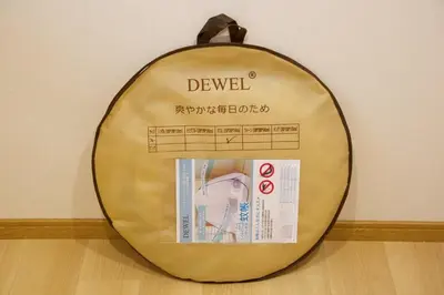 a clock on the wall with a sign on it at \u897f\u65b0\u5c0f\u5ca94\u4e01\u76ee in Tokyo