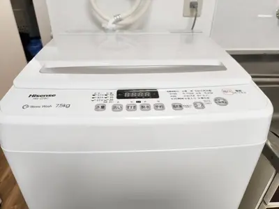a white washer and dryer in a room at Shinjuku Tokyo \u6771\u4eac\u65b0\u5bbf SS in Wada