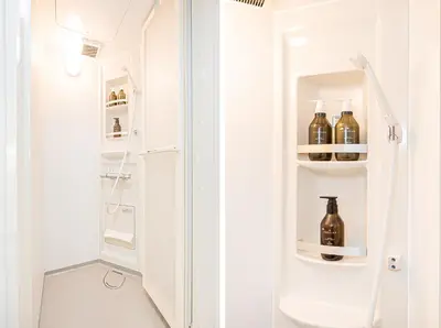 a bathroom with a shower with bottles on shelves at Tawaramachi Stay 2 minutes' walk from Tawaramachi Station and 10 minutes' walk from Asakusa Station in Tokyo