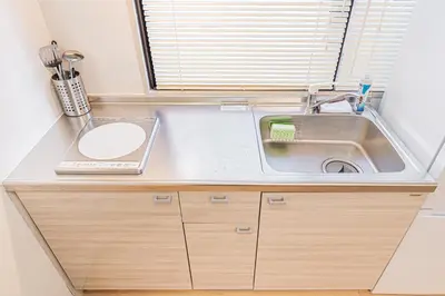 a kitchen counter with a sink and a sink at Tawaramachi Stay 2 minutes' walk from Tawaramachi Station and 10 minutes' walk from Asakusa Station in Tokyo