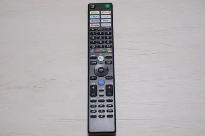 a remote control sitting on top of a table at 15minutes walk from Skytree -Mukojima House- in Tokyo