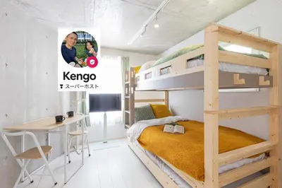 a bedroom with a bunk bed and a desk at Tokyo Oji Apartment 3A in Tokyo