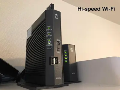 a hp speed wtii router sitting on a table at Tokyo Oji Apartment 3A in Tokyo