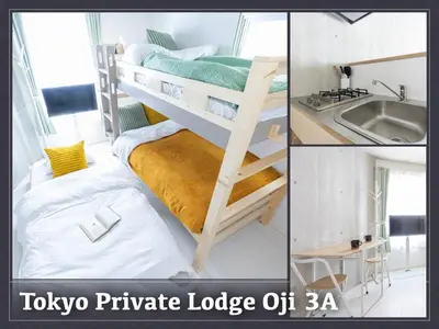 a room with two bunk beds and a sink at Tokyo Oji Apartment 3A in Tokyo