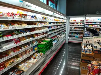 an aisle of a supermarket with eggs and food at Tokyo Oji Apartment 3B in Tokyo