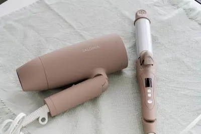 a nintendo wii game controller next to a wii remote at THE CAMINO Nakano 302 in Tokyo