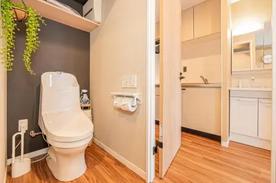 a bathroom with a toilet and a sink at Komorebi Asakusa Cozy 4P Stay The 77 House Tokyo in Tokyo