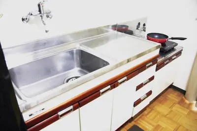 a kitchen with a stainless steel sink at Sweet House\u6771\u6c60\u888b in Tokyo