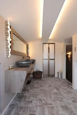 a bathroom with a sink and a mirror at Shinjuku Gyoen house 2LDK in Tokyo