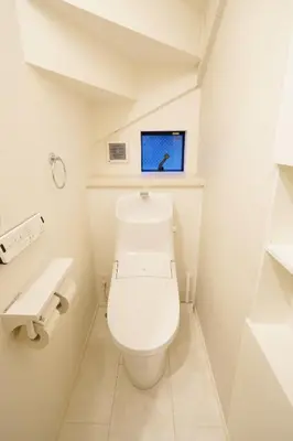 a white bathroom with a toilet and a sink at Chihaya house \u5343\u65e9\u30cf\u30a6\u30b9 in Tokyo