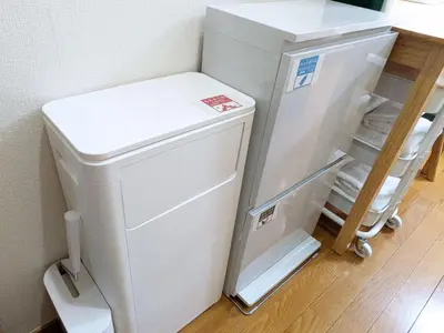 a white refrigerator with its door open in a kitchen at Laze Nakano 2bed Travel Work Broadway in Tokyo