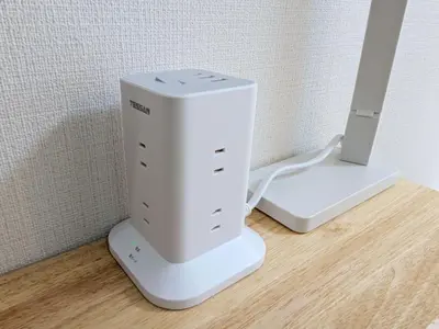 a white router sitting on top of a wooden table at Laze Nakano 2bed Travel Work Broadway in Tokyo