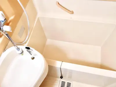 a bathroom with a toilet and a sink at Shinjuku Okubo House close to Kabukicho in Tokyo