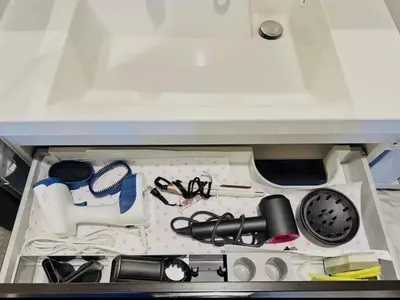 a drawer filled with cooking utensils and other items at Miyazaki in Tokyo