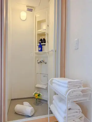 a bathroom with a towel rack and a toilet at Itabashi City, Nakadai 2LDK-IT0395 in Tokyo