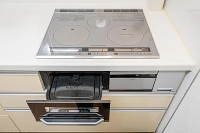 a white counter top with an electronic device at Ohanachaya station 5-minute walk 4ldk house maxi 9people family friendly in Tokyo