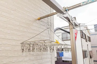 a chandelier hanging from the side of a building at Ohanachaya station 5-minute walk 4ldk house maxi 9people family friendly in Tokyo