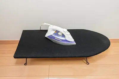 a iron sitting on top of a black table at Ohanachaya station 5-minute walk 4ldk house maxi 9people family friendly in Tokyo