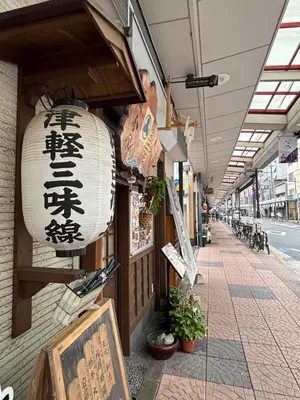 a building with chinese signs on the side of it at Yui SAYAKA-SAYAKA 701 Luxury Upper-Floor Stay Near Asakusa in Tokyo