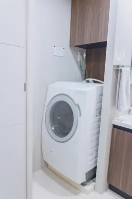 a washer and dryer in a laundry room at Yui Asakusa-MIYABI 702 City-Center Luxury Stay-Walk to Asakusa in Tokyo