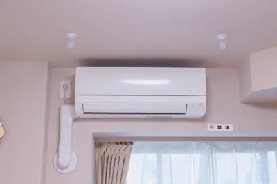 a television hanging from a ceiling in a room at Yui Asakusa-MIYABI 702 City-Center Luxury Stay-Walk to Asakusa in Tokyo
