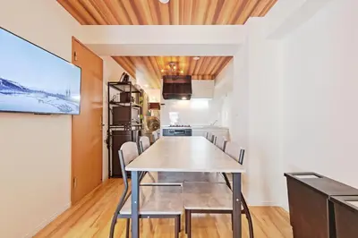 a kitchen and dining room with a table and chairs at V Close to Shinjuku Kabukicho Korean Town FrWIFI B in Tokyo
