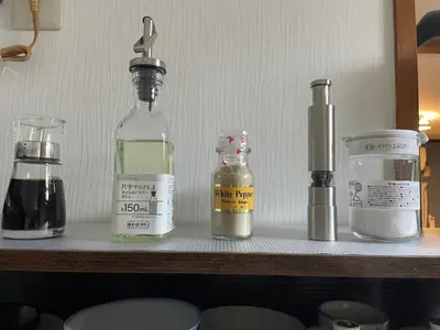 a shelf with bottles and other items on it at Mie's House Skytree 美英軒 in Tokyo