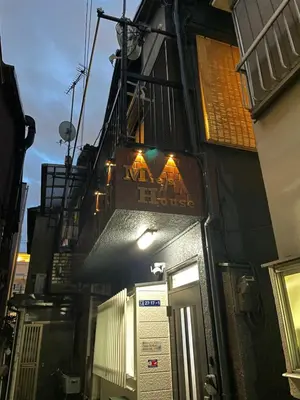 a building with a sign on the side of it at Mie's House Skytree 美英軒 in Tokyo