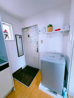 a small bathroom with a toilet and a shower at M-house in Tokyo