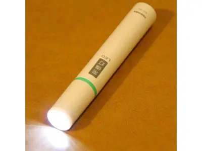 a white remote control sitting on a table at Smile Hotel Tokyo Shinkoiwa - Vacation STAY 82158v in Tokyo