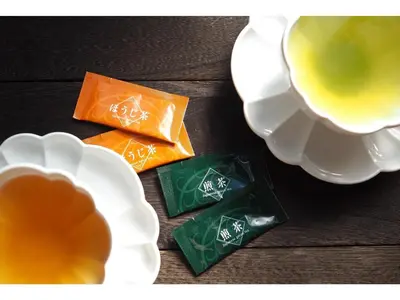a table with a cup of tea and some chocolates at Smile Hotel Tokyo Shinkoiwa - Vacation STAY 82158v in Tokyo