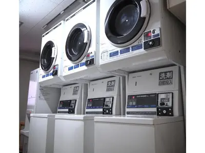 a row of washing machines on display in a store at Smile Hotel Tokyo Shinkoiwa - Vacation STAY 82164v in Tokyo