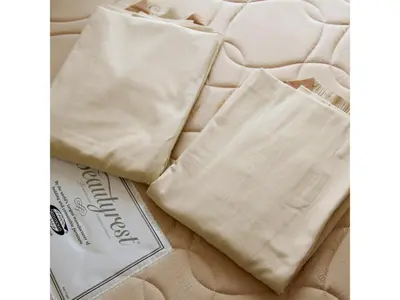 a bed with two white bags on top of it at Smile Hotel Tokyo Shinkoiwa - Vacation STAY 82154v in Tokyo