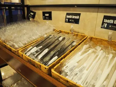 a basket of utensils in plastic bags in a store at Smile Hotel Tokyo Shinkoiwa - Vacation STAY 82154v in Tokyo