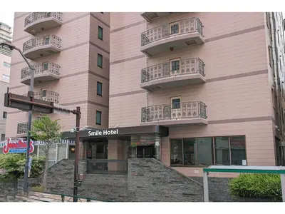 a building with balconies on the side of it at Smile Hotel Tokyo Shinkoiwa - Vacation STAY 82190v in Tokyo