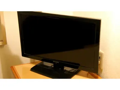 a computer monitor sitting on top of a table at Smile Hotel Tokyo Shinkoiwa - Vacation STAY 82171v in Tokyo