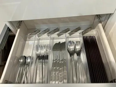 a bunch of utensils are hanging in a drawer at YOYOGIHOUSE - Vacation STAY 19984 in Tokyo