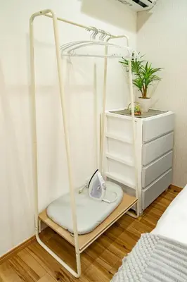 a swing bed in a bedroom with a dresser at \u30b2\u30b9\u30c8\u30cf\u30a6\u30b9\u66f3\u821f in Tokyo
