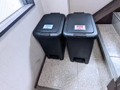 two trash cans sitting on the side of a wall at East-Nihonbashi House 2bed Travel Work in Tokyo