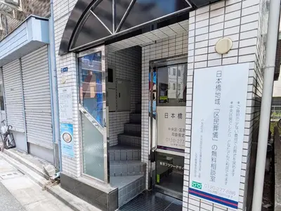 an entrance to a building with a revolving door at East-Nihonbashi House 2bed Travel Work in Tokyo
