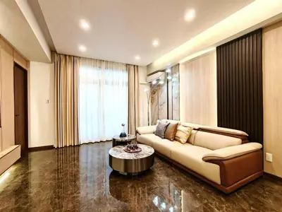 a living room with a couch and a table at A1 Shinjuku JR St 8 mins 4 bedrooms and 1 living room 2bathrooms 2toilets Max 12P Direct to Shinjuku Ueno Ginza Shibuya Ikebukuro Yoyogi Shinagawa \u65b0\u5bbf\u533a \u9ad8\u7530\u9a6c\u573a\u8f66\u7ad98\u5206\u949f 4\u5ba41\u53852\u6d74\u5ba42\u536b\u751f\u95f4 \u6700\u592712\u4eba in Tokyo