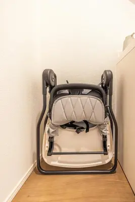a chair sitting in the corner of a room at 7min Walk from Station 100sqm Max 10 Direct to Skytree Haneda Narita New Built in Tokyo