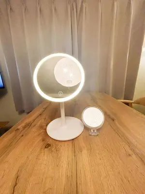 a white mirror sitting on top of a wooden table at Family Friendly Japanese Style Room near Skytree in Tokyo