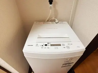 a white toilet with a box on top of it at HANANOSATO\u677f\u6a4b\u4e2d\u4e38\u753aa in Tokyo