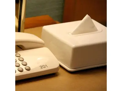 a toaster and a phone sitting on a table at Smile Hotel Tokyo Shinkoiwa - Vacation STAY 33630v in Tokyo