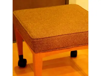 a brown stool with black wheels on a table at Smile Hotel Tokyo Shinkoiwa - Vacation STAY 33620v in Tokyo