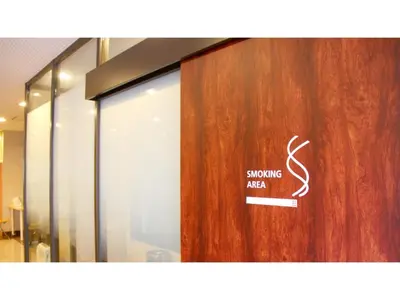 a wooden door with a sign on it at Smile Hotel Tokyo Shinkoiwa - Vacation STAY 33620v in Tokyo