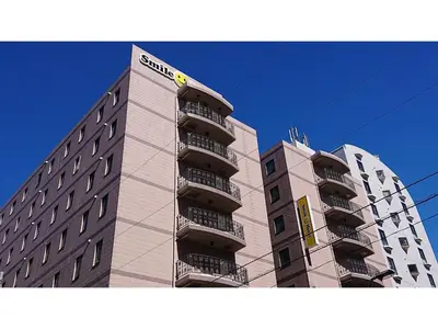 two tall buildings are next to each other at Smile Hotel Tokyo Shinkoiwa - Vacation STAY 33631v in Tokyo