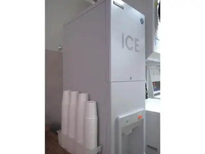 a white refrigerator with styrofoam cups in it at Smile Hotel Tokyo Shinkoiwa - Vacation STAY 33628v in Tokyo